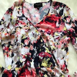 Floral romper with long sleeves